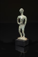 Statuette votive représentant un personnage stylisé