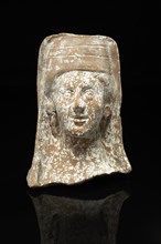 Magna Graecian votive female head