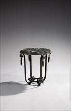 Pedestal table with a circular tray