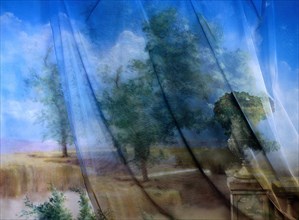 Painted backdrop on a tarp of a landscape