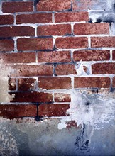 Painted backdrop. Partly destroyed brick wall