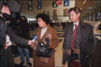 12/27/2001.  Alleged WTC terrorist Zacarias Moussaoui's mother Aicha leaves for Washington with her son's new lawyer François Roux.