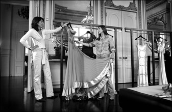 05/00/2003. Clotilde Courau tries gowns on at Valentino's before the 56th Cannes Film