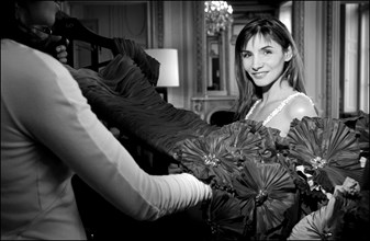 05/00/2003. EXCLUSIVE Clotilde Courau tries gowns on at Valentino's before the 56th Cannes Film