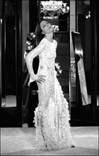 05/00/2003. Elsa Zylberstein tries gowns on at Chanel's before the 56th Cannes Film