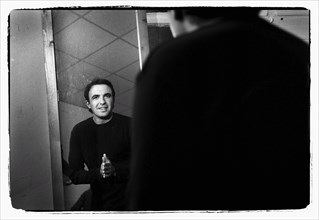12/00/2003. Nikos Aliagas, host of the Star Academy shows backstage and on stage.