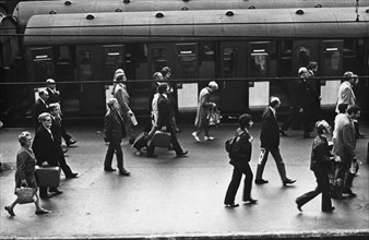 Travailleurs arrivant à la gare de Liverpool Street, Londres