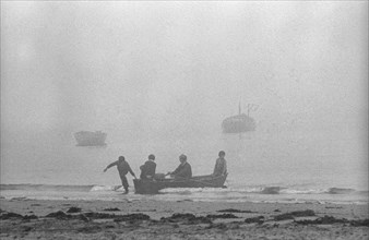 Boat landing in mist, Saltee Islands