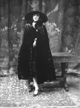 Female model wearing a fur coat designed by Max Leroy