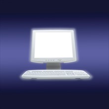 A futuristic computer and monitor.