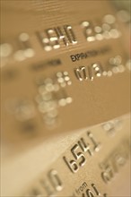 Closeup of gold credit cards.