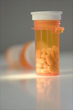 Closeup of prescription pill bottles.