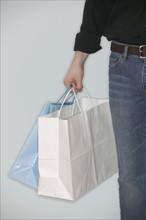 Man holding shopping bags.