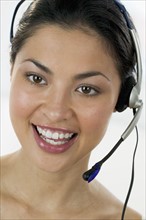Woman using a headset.