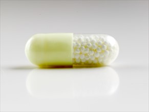 Medication in a capsule.