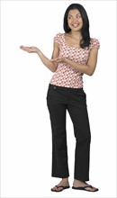 A woman gesturing with her hands.