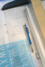 Architectural tools and blue prints.