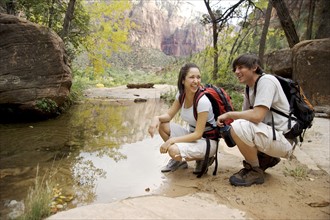 Backpacking couple in Zion National Park Utah USA.