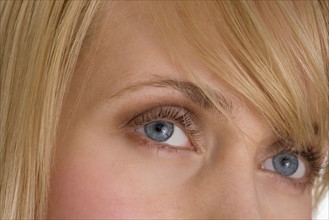 Closeup of blond woman's eyes.