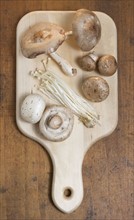 Mushrooms on cutting board.