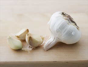 Closeup of garlic head and cloves.