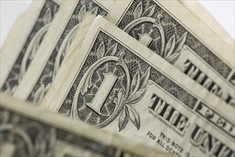 Closeup of one dollar bills.