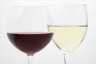 Red and white wine in glasses.