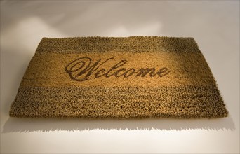 Closeup of a welcome mat.