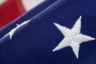 Closeup of star on American flag.