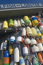 Buoys hanging on building.