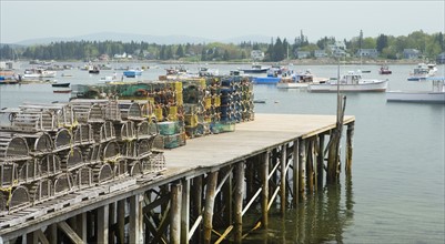Lobster traps on a dock Maine.