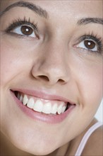 Closeup of smiling woman.