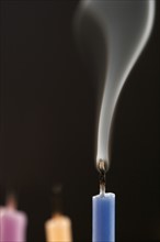 Closeup of blown out candles.