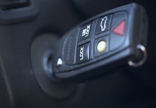 Closeup of key in car ignition.