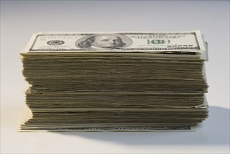 Closeup of a stack of American money.