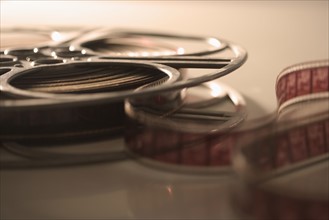 Closeup of film reel unrolling.