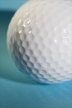 Closeup of a golf ball.