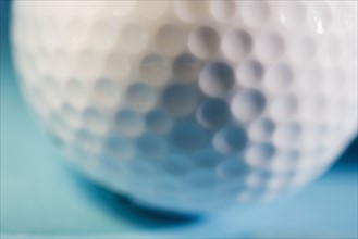Closeup of a golf ball.