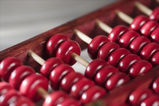 Closeup of a wooden abacus.
