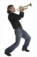Man playing horn.
