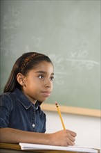 Young girl in classroom.