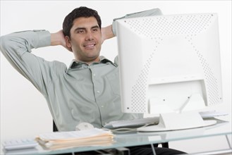 Man looking at his computer.