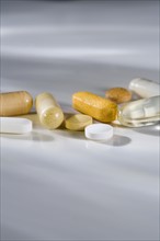 Closeup of a variety of pills.
