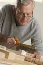 Man working with wood.