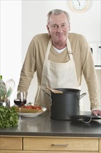 Portrait of man cooking.