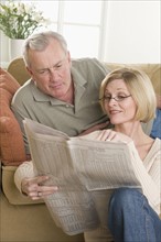 Couple relaxing at home.