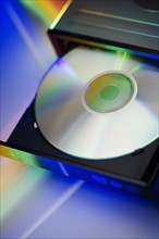 Still life of disc in computer drive.