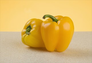 Closeup of yellow peppers.