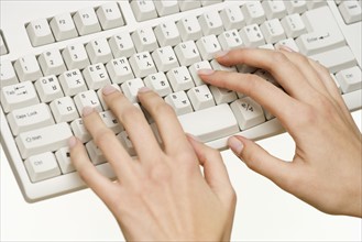 Female  hands on computer keyboard.