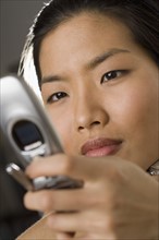 Young woman using a mobile phone.